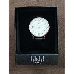 Q&Q Men's Analog Wrist Watch With White Dial and Black Leather Band.